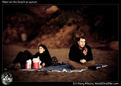 Mate on the beach at sunset